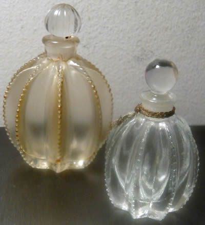 Flowers of Devonshire Perfume Bottles By Mary Dunhill That Are Close Copies of The R. Lalique Gregoire Perfume Bottle and also Close Copies of the Original R. Lalique Flowers of Devonshire Perfume Bottle that Lalique made for Mary Dunhill