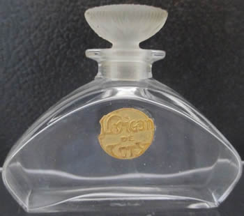 Heliotrope Perfume Bottle Made By Coty Glassworks That Is A Copy Of The Rene Lalique Design