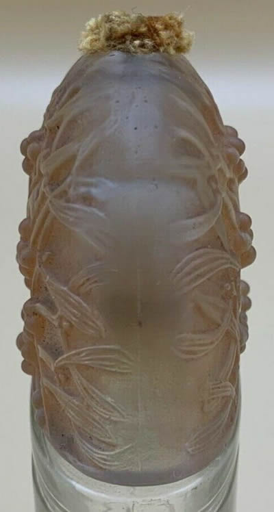Sous Le Gui Perfume Bottle Elongated Dome Shaped Cover  Side View Designed By André Jolivette In 1924 for Jean De Parys and later replaced by a more refined and coherent René Lalique Cover In 1926