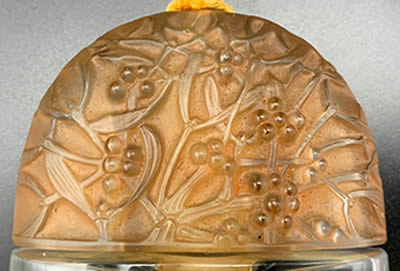 Sous Le Gui Perfume Bottle Elongated Dome Shaped Cover Designed By André Jolivette In 1924 for Jean De Parys Side 1 of 2 later replaced by a more refined and coherent René Lalique Cover In 1926