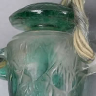 R. Lalique Red Glass Meduse Vase Close-Up