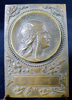 Louis Armand Rault Medallion of Helmeted Figure In Profile With The Word Merovee Set In A Bronze Rectangular Plaque With LR Signature - RL Signature