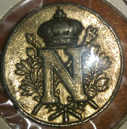 Back Side View Of Louis Armand Rault Medallion of Napoleon Wearing A Hat In Profile Molded Napoleon I with LR Signature - RL Signature On The Front And Here The Back View Showing An N Under A Crown In A Coat of Arms Style