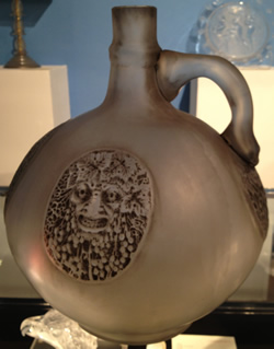 R. Lalique Quatre Masques Vase With Handle” title=